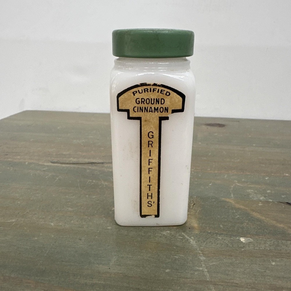 Vintage Griffith's Cinnamon 3/4 oz spice bottle White Milkglass jar Green lid